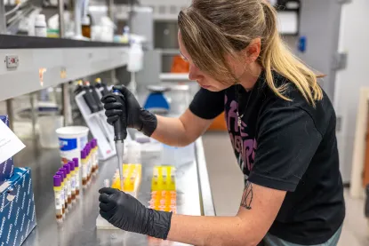 Graduate student in the NMU chemistry lab.