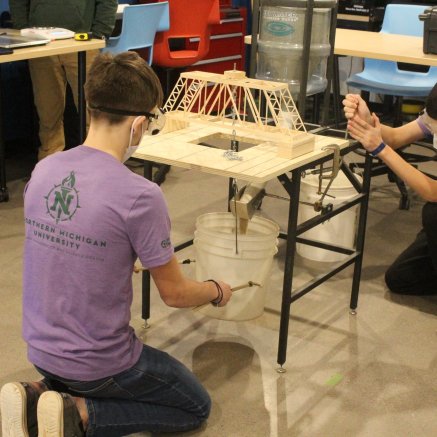 high school students competing at science olympiad event