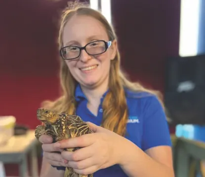Shannon Darby holding turtle