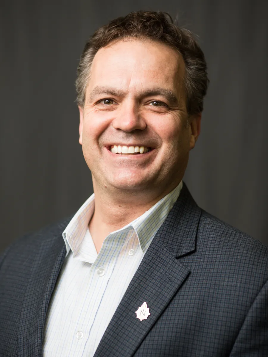 Steve VandenAvond portrait on black background.