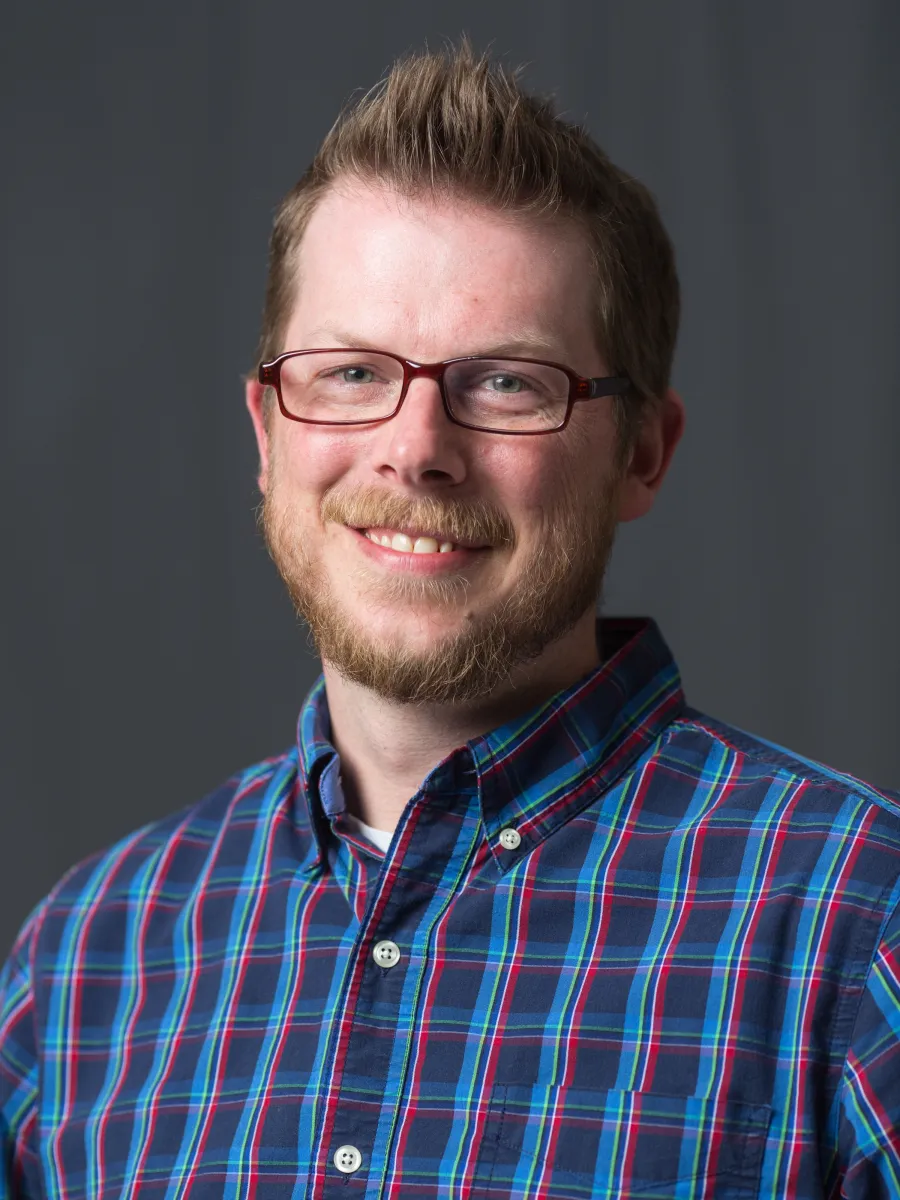 Jason Nicholas portrait on gray background