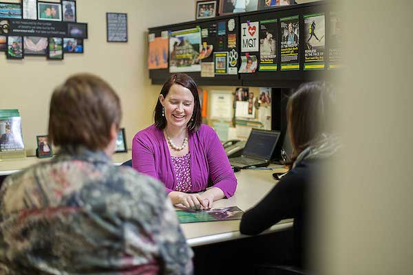 NMU Admissions Counselor with student and parent