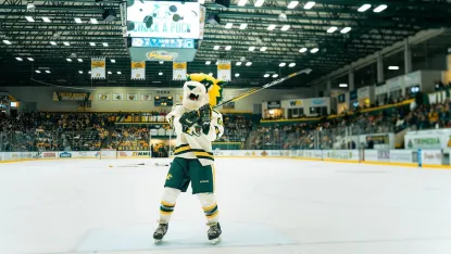 Wildcat Willy skating on the ice at the Berry Events Center