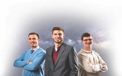 Three men post amidst a space backdrop