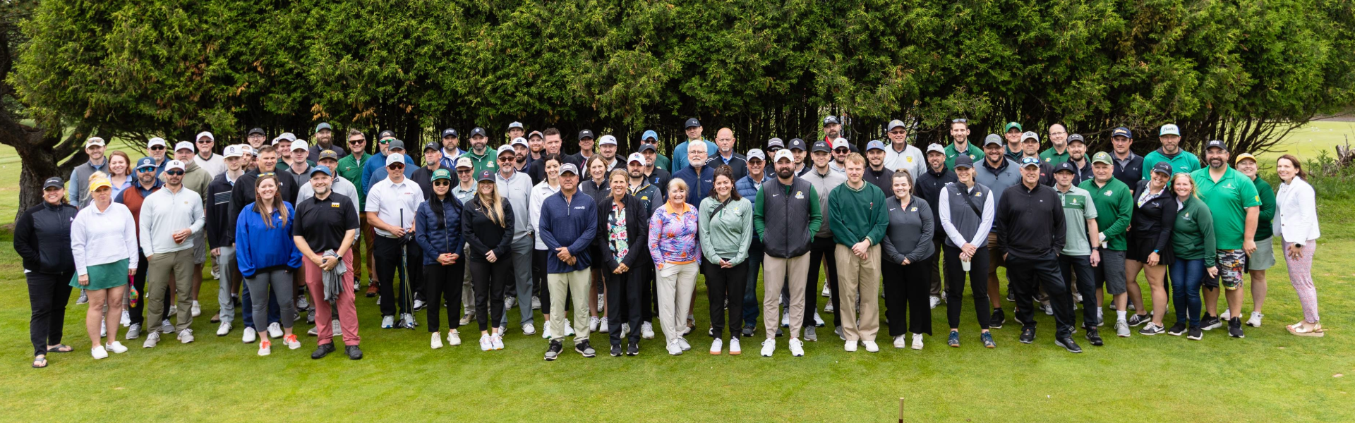 Golf outing group photo with attendees from last years Arts and Athletics.