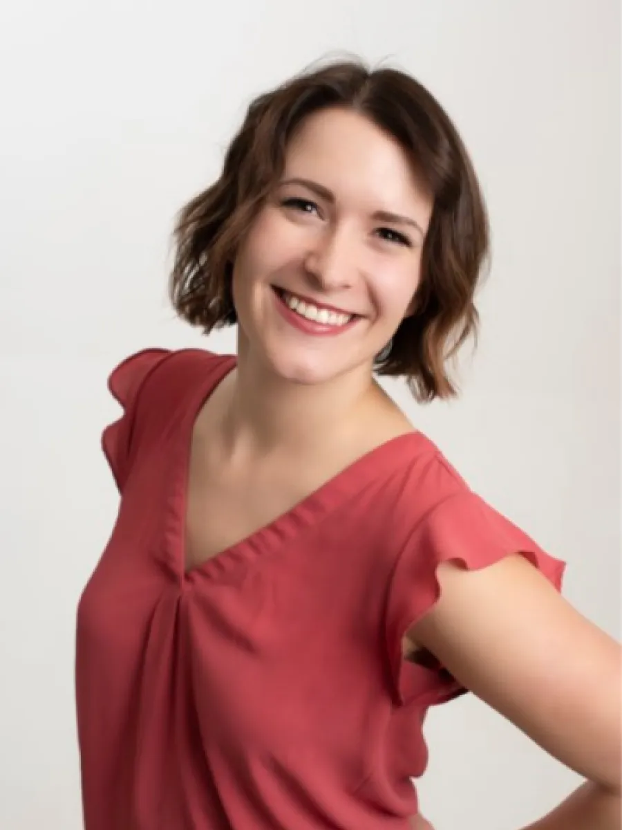 Headshot of Maureen McFadden smiling in a pink blouse.