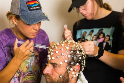 Students with neuroscience head net