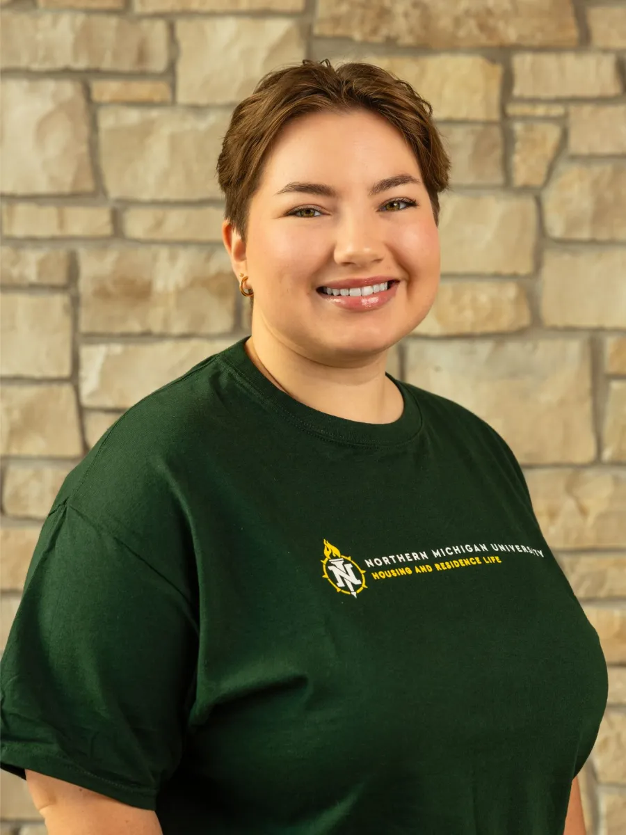 decorative image of Erin Peckham, up campus representative