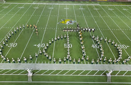 Marching band spelling "cats"