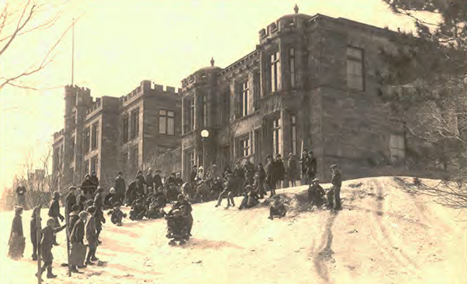 Students outside of Peter White Hall of Science