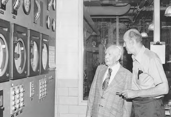 Two men in the heating plant