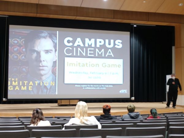 Dr. Chet Defonso giving introductory remarks before the showing of the film The Imitation Game