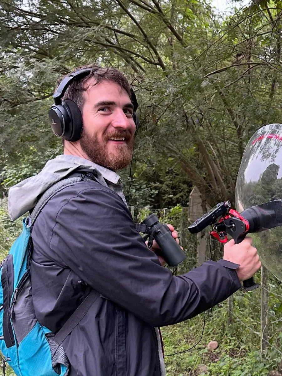 Hans Otto using a directional microphone to record animal calls