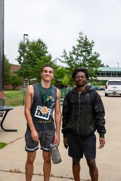 Two people posing after the BIPOC Outdoors 5K race