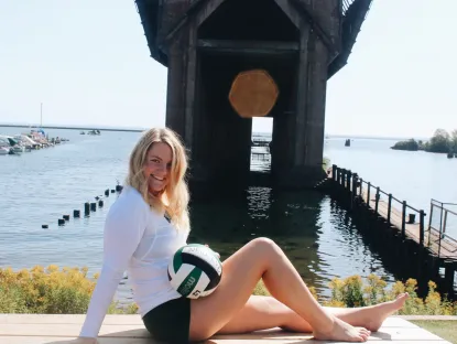 Mackenzie in front of the Ore Dock in her volleyball uniform