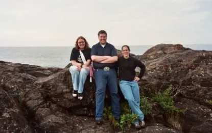 Three people on rocks