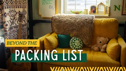 "Beyond the Packing List" Northern Michigan University - picture of a yellow couch in a dorm room
