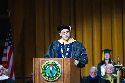 President Tessman speaking at the commencement ceremony