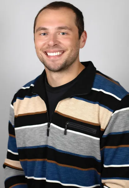 Headshot of Thomas Roush