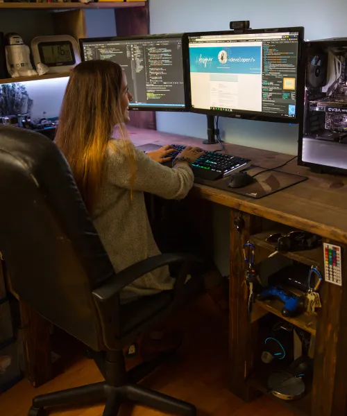 Female programmer working on a computer