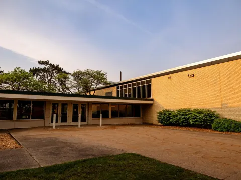 McClintock is a brick building with a glass-fronted entrance 