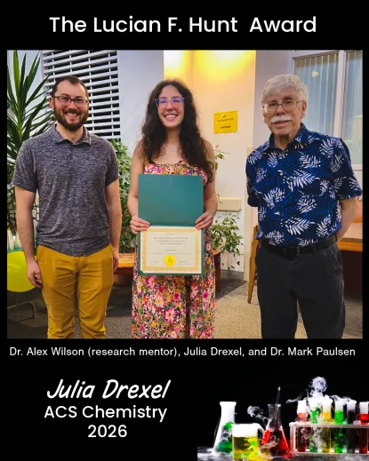 Image of Julia Drexel receiving an award from Mark Paulsen and Alex Wilson