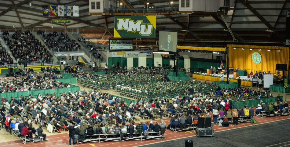 Birds-eye view of graduates at commencement