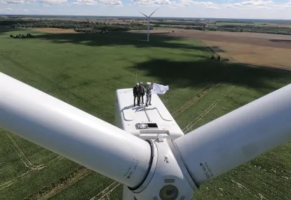 People on a wind turbine