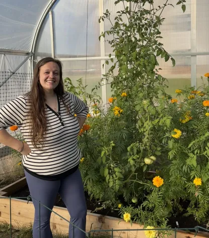 Katy Pawlusiak in the Hoop House