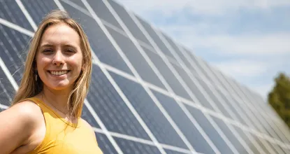 sustainability leadership banner, student and solar panel