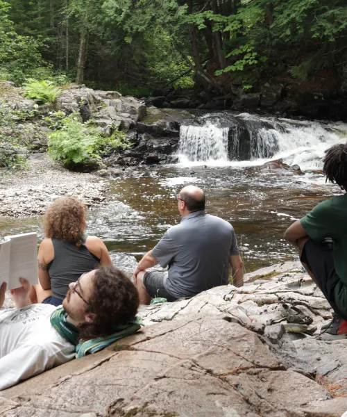 OEP Students looking at a Waterfall in Big Bay, MI