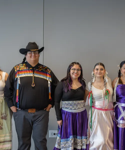 Students posing during the Indigenous Fashion Show. 