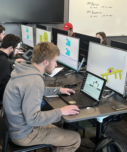 Students working in the CAD lab within the Jacobetti Complex.