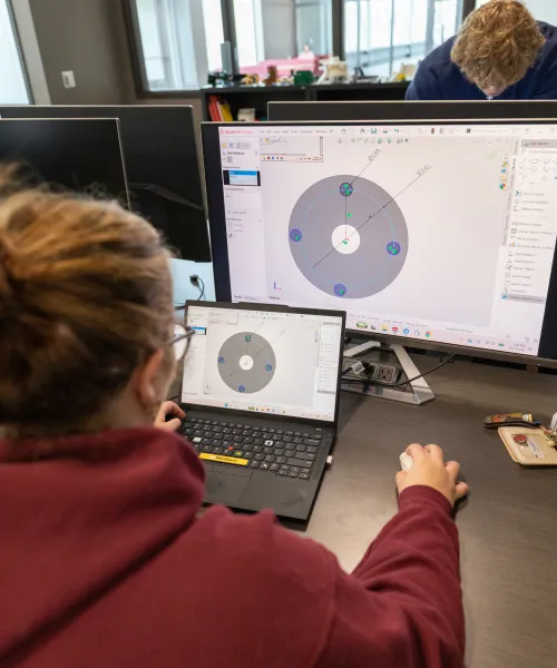 Students working on a design project within the CAD lab in the Jacobetti Complex at NMU.