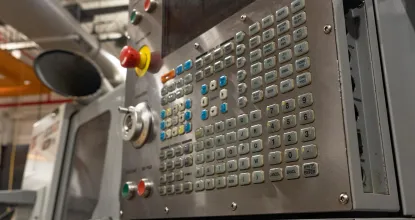 The programming panel for a CNC machine.