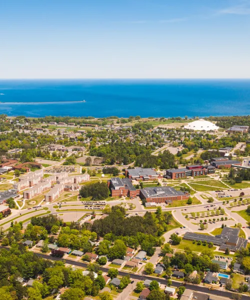 Aerial photo of NMU's campus and Marquette, MI