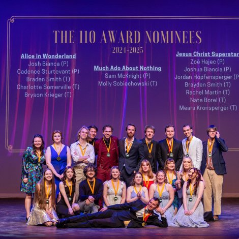 Group of people standing on stage, receiving an award at the 2025 Theatre and Dance James Awards.