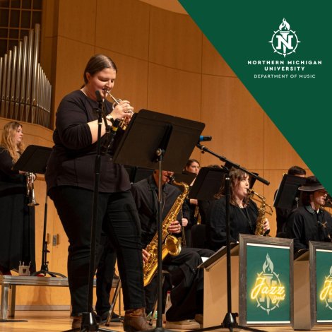Northern Michigan University jazz ensemble performs in wood-paneled concert hall; a woman plays trumpet before saxophonists and Jazz branding.