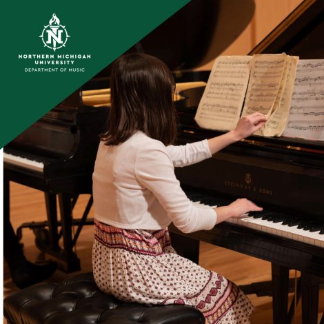 Northern Michigan University music graphic shows a woman pianist reading sheet music at a Steinway grand piano in a warm, focused setting.