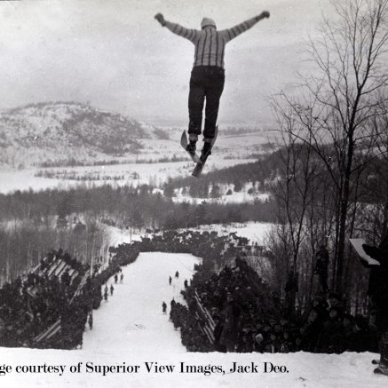 Image showcases a ski jumper