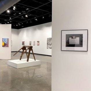 A view of several artworks in the Still Life exhibition at the DeVos Art Museum at NMU.