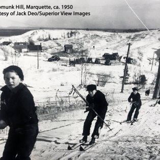 photo of skiers going up chipmunk hill ca. 1950