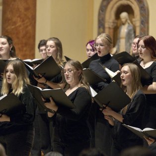 NMU Choirs singing in St. Peter Cathedral in Marquette