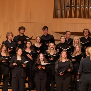 Part of the NMU Choral Ensembles led by a student conductor in the October '24 Choral Concert