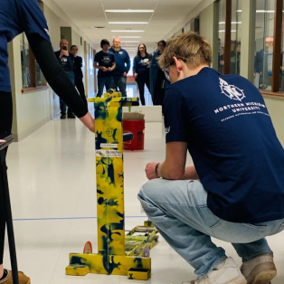student competing in science olympiad event