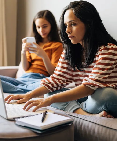 Mother and daughter working on homework