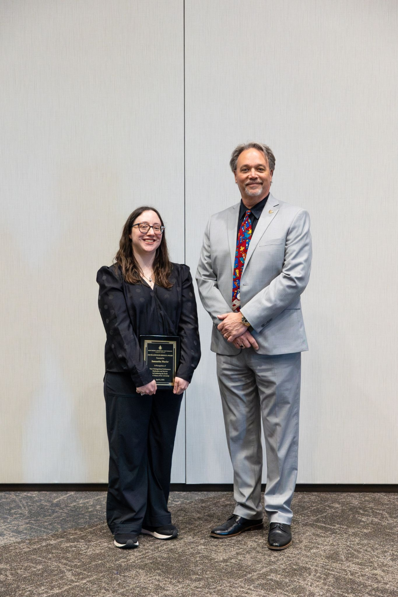 Sam Marier and President Chris Olsen with Marier's Award