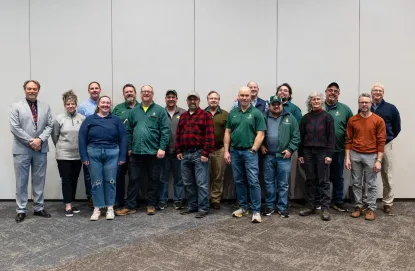 Distinguished Team Award Winner: Facilities Semester Break Storm Response Team. Names of team members are listed below this photo.