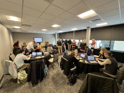 NMU staff and faculty in a meeting