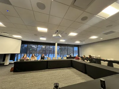 NMU staff and faculty in a meeting